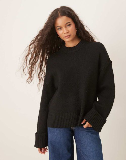 Relaxed crew neck folded sleeve knit sweater in black