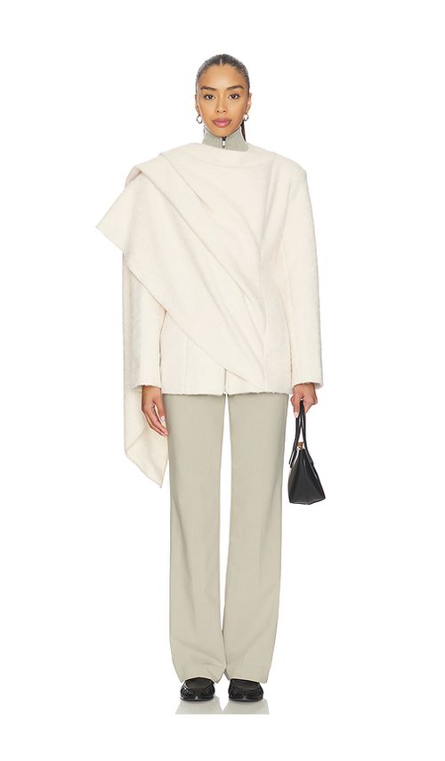 SELMACILEK Cape Coat in Cream. L. Also in M