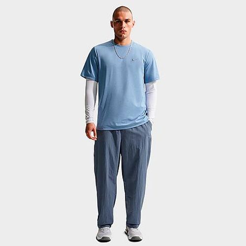 Men's N. A.C. Dri-FIT Woven Training Pants in Diffused Blue/Pale Ivory/Diffused Blue