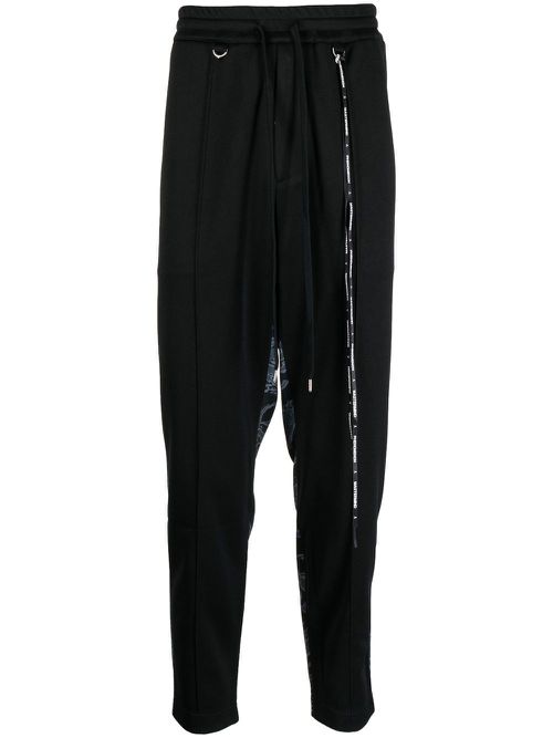 Camouflage-print track pants - Black