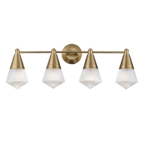Natural Aged Brass Four Light Bath Vanity from the Hargreaves Collection