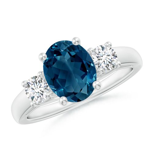 Angara 2.25 Carats Oval London Blue Topaz and Round Diamond Three Stone Ring in Silver