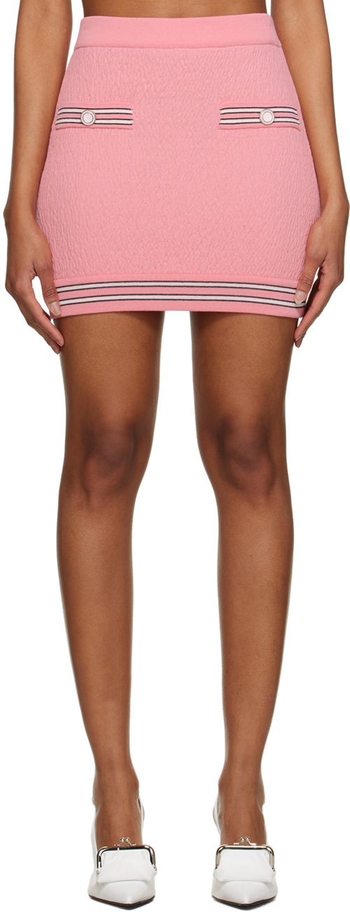 Pink button mini skirt