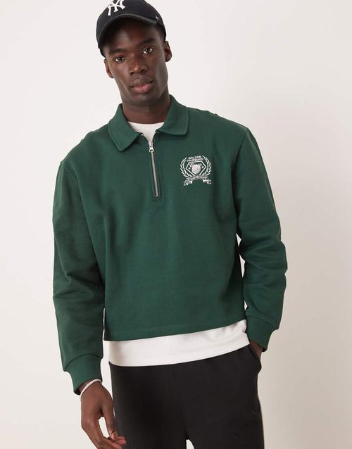 ASOS DESIGN boxy oversized polo shirt with tipping and embroidered chest print in green