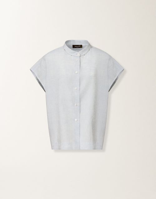 Sleeveless shirt in sky-blue linen fabric