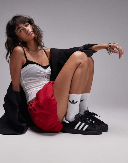 Superstar II ponyhair trainers in black and white