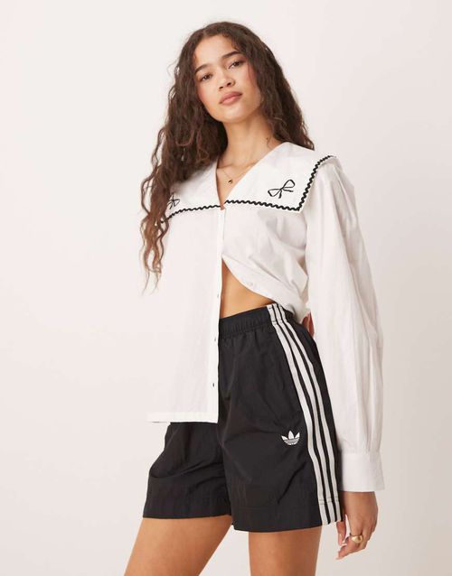 Adicolor 3 stripe woven shorts in black