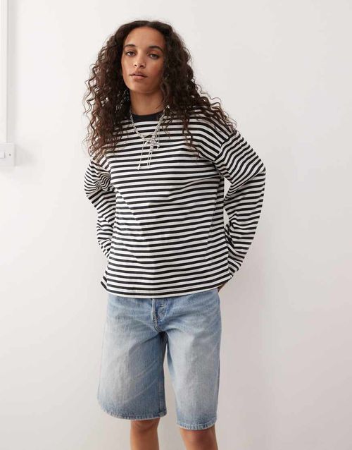 Oversized long sleeve t-shirt with side slits in black and white stripe