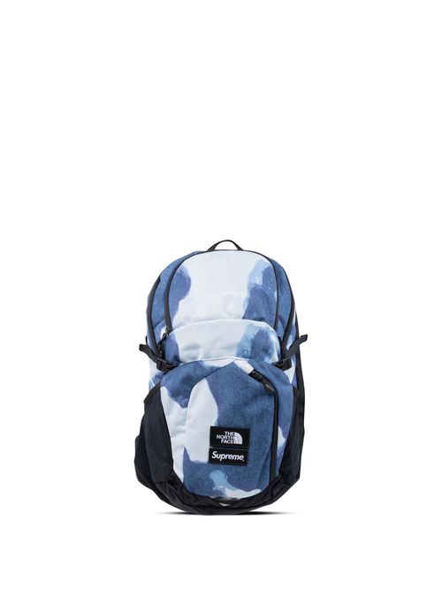 Supreme | x The North Face bleached denim print backpack - Blue