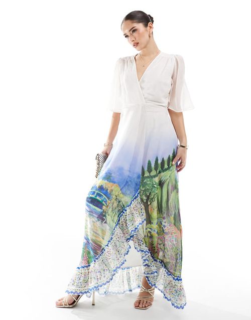 Hope & Ivy flutter sleeve maxi wrap dress with tie waist in white scenic print