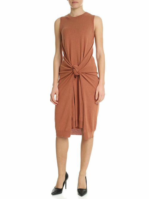 Knitted dress in copper red with knot