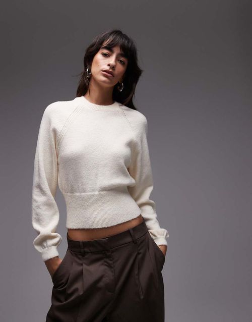 Fluffy knitted jumper with cinched waist in ecru-White