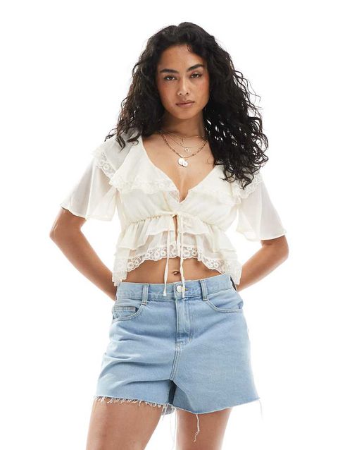 Ruffle tie front blouse in ecru-White