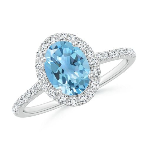 Angara 1.5 Carats Prong-Set Oval Swiss Blue Topaz Halo Ring with Diamonds in Platinum