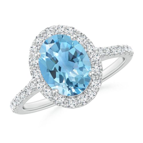 Angara 2.25 Carats Prong-Set Oval Swiss Blue Topaz Halo Ring with Diamonds in Platinum