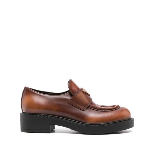 Triangle-logo leather loafers