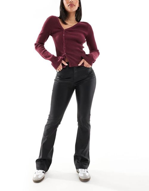 Vero Moda Flash coated kick flare jeans in black