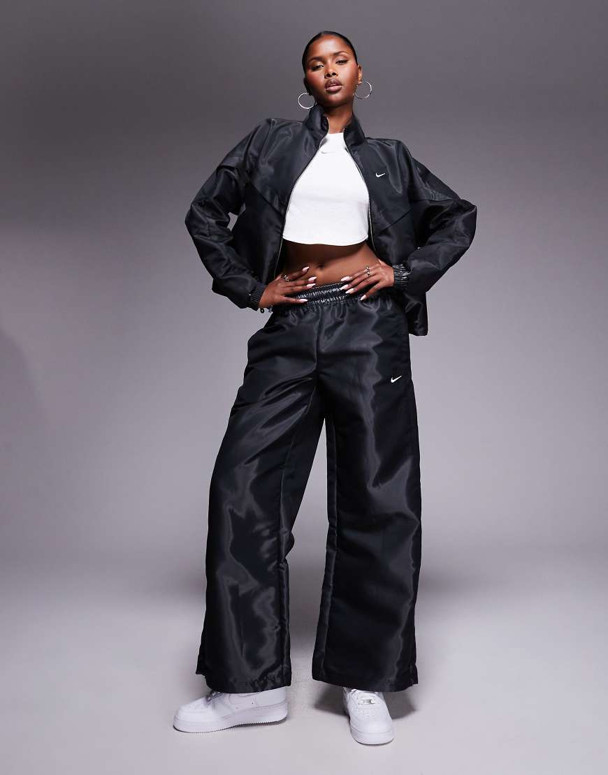Windrunner Liquid Shine track pant in black
