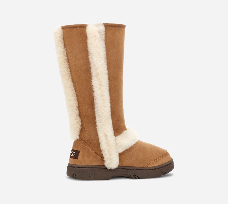 ® Women's Sunburst Tall Warm Sheepskin Boots in Brown/