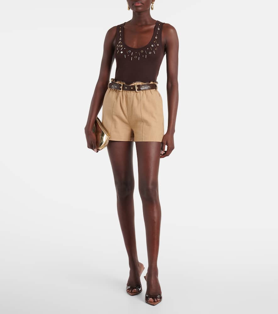 Belted faux leather-trimmed shorts
