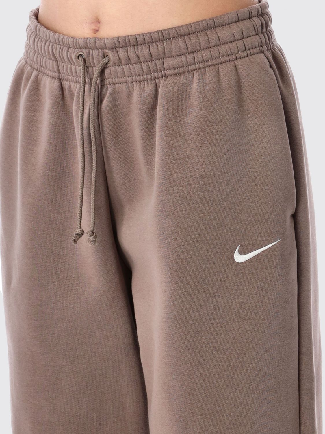 Swoosh-embroidered track pants - White
