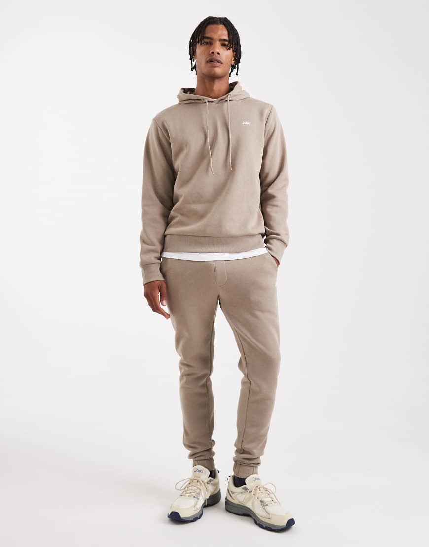Slim sweatpants with logo in beige-Neutral