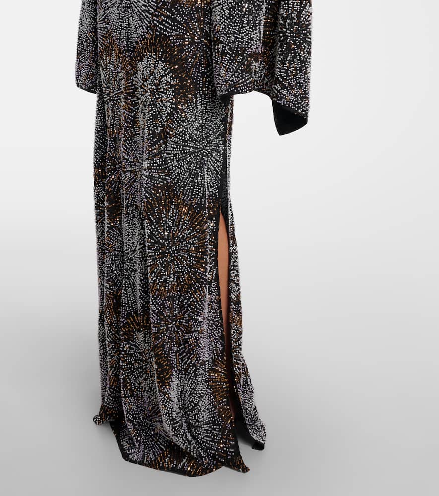 Embellished caped gown