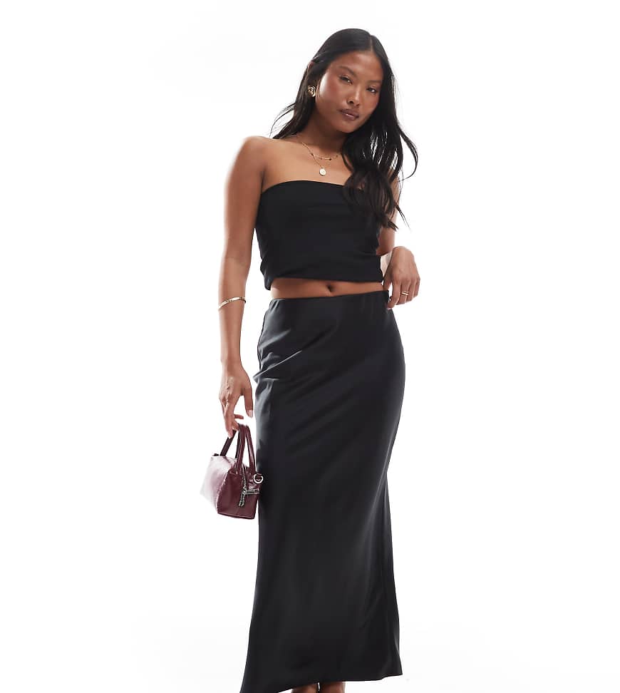 ASOS DESIGN Petite satin bias midi skirt in black