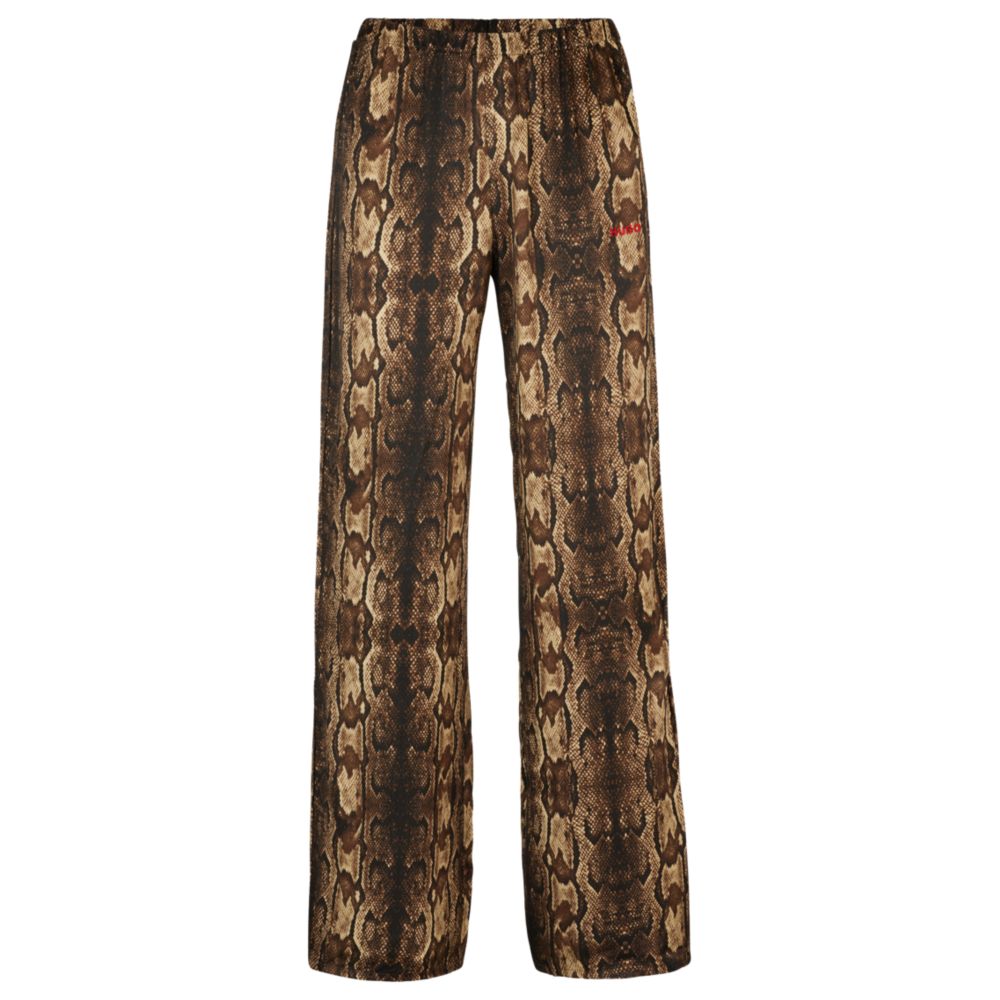 Pajama bottoms in satin with snake print