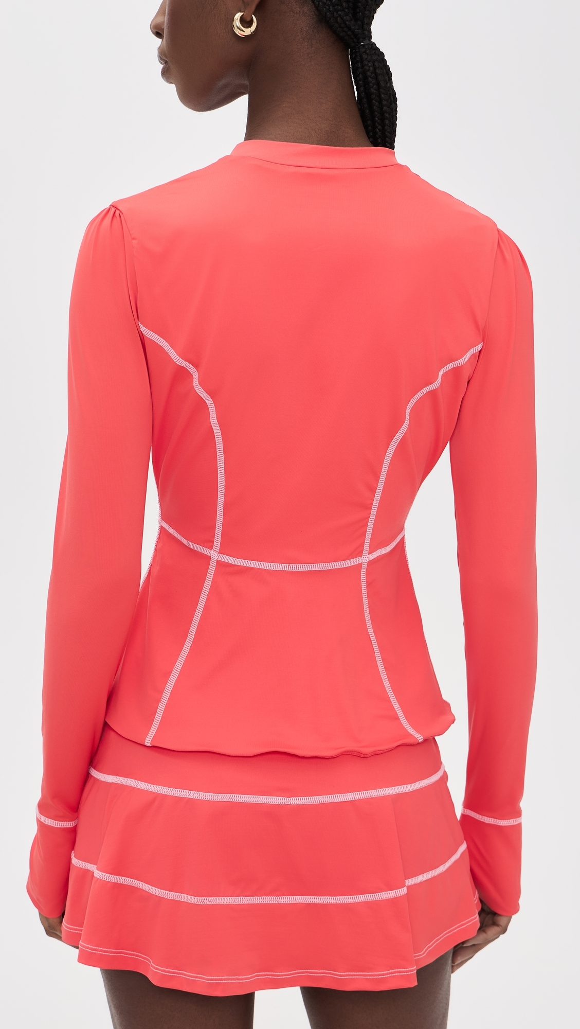 The Alexia Rashguard Top Coral