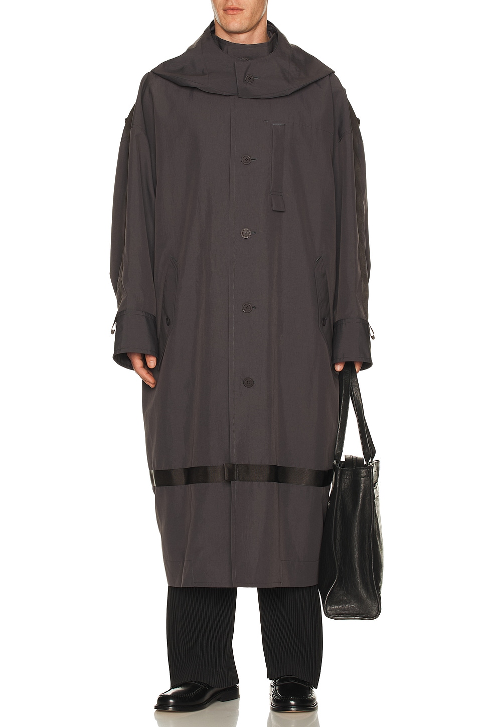 Homme Plisse Issey Miyake Carrier Carried Coat in Charcoal - Charcoal. 3 also in