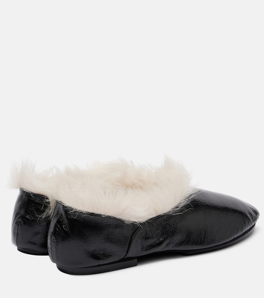 Shearling-trimmed leather slip-on shoes