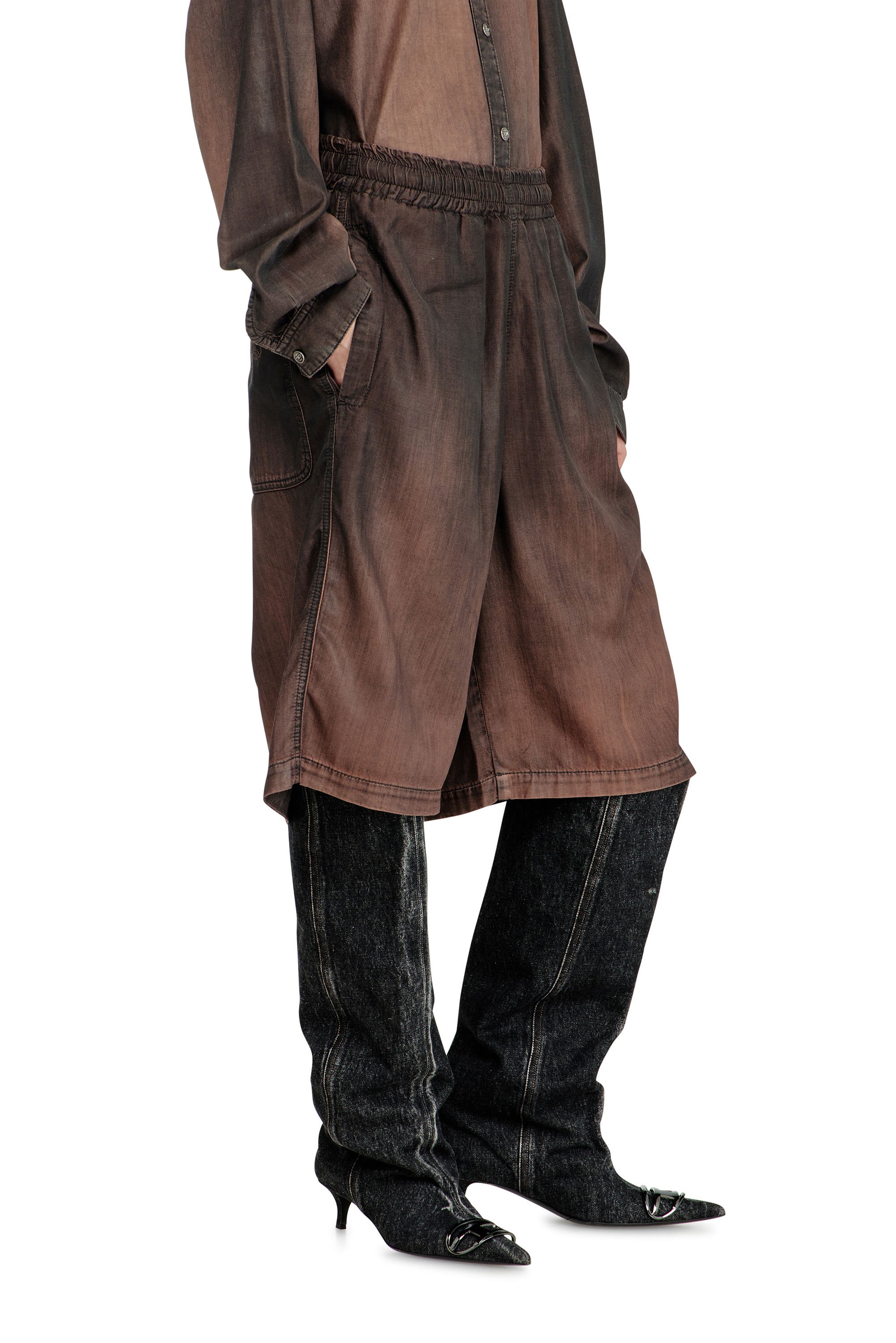 Relaxed bermuda shorts in fluid coated denim - Denim short pants - Unisex - Brown