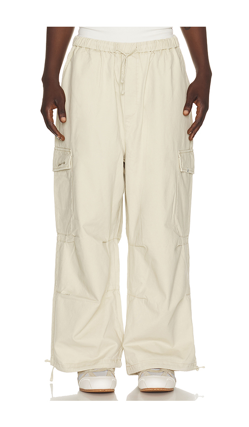 DRMERS CLUB Smiley Logo Parachute Pants in Light Beige. XL/1X also in S