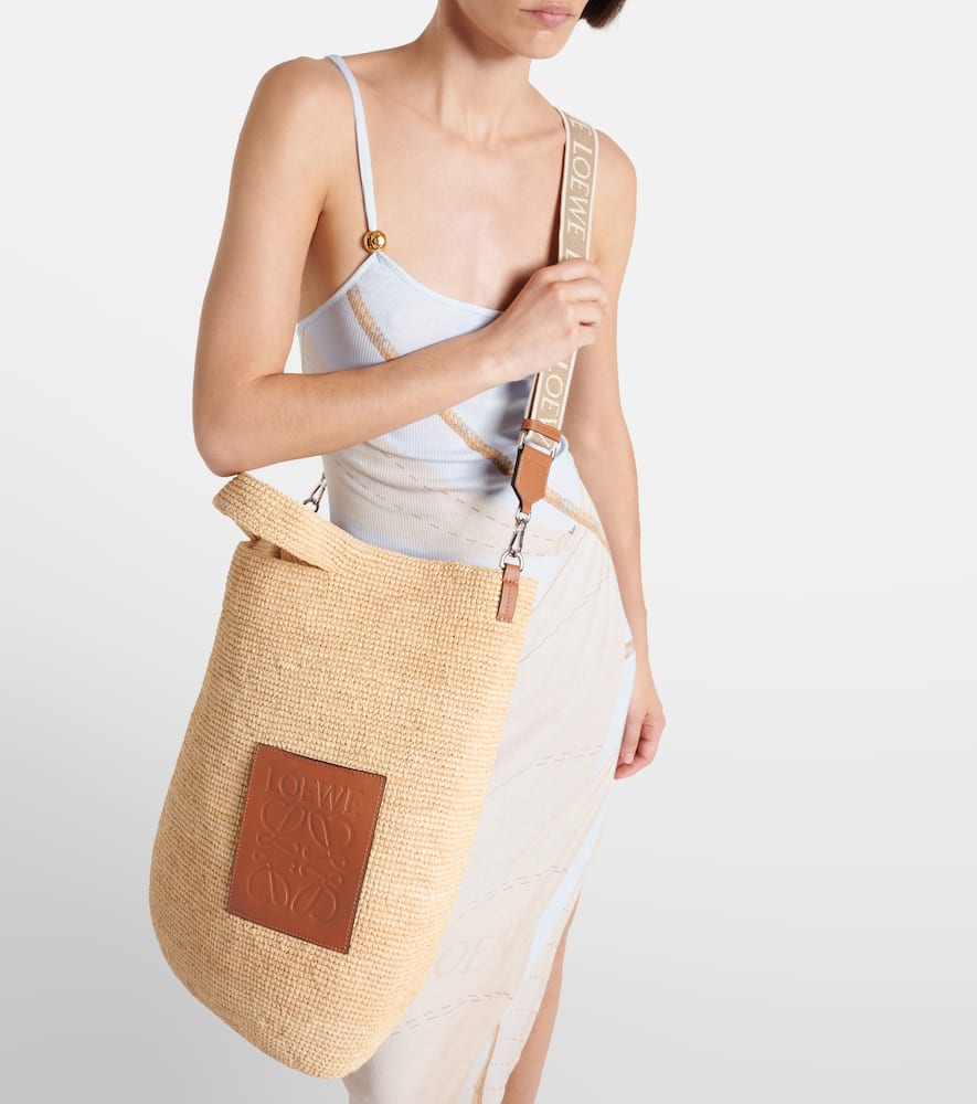 Large leather-trimmed raffia tote bag