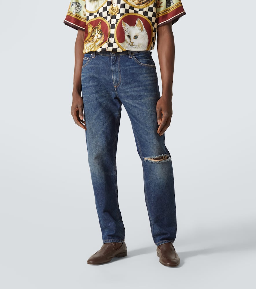 Distressed slim jeans