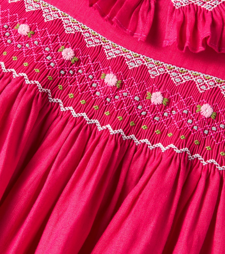 Embroidered smocked linen dress