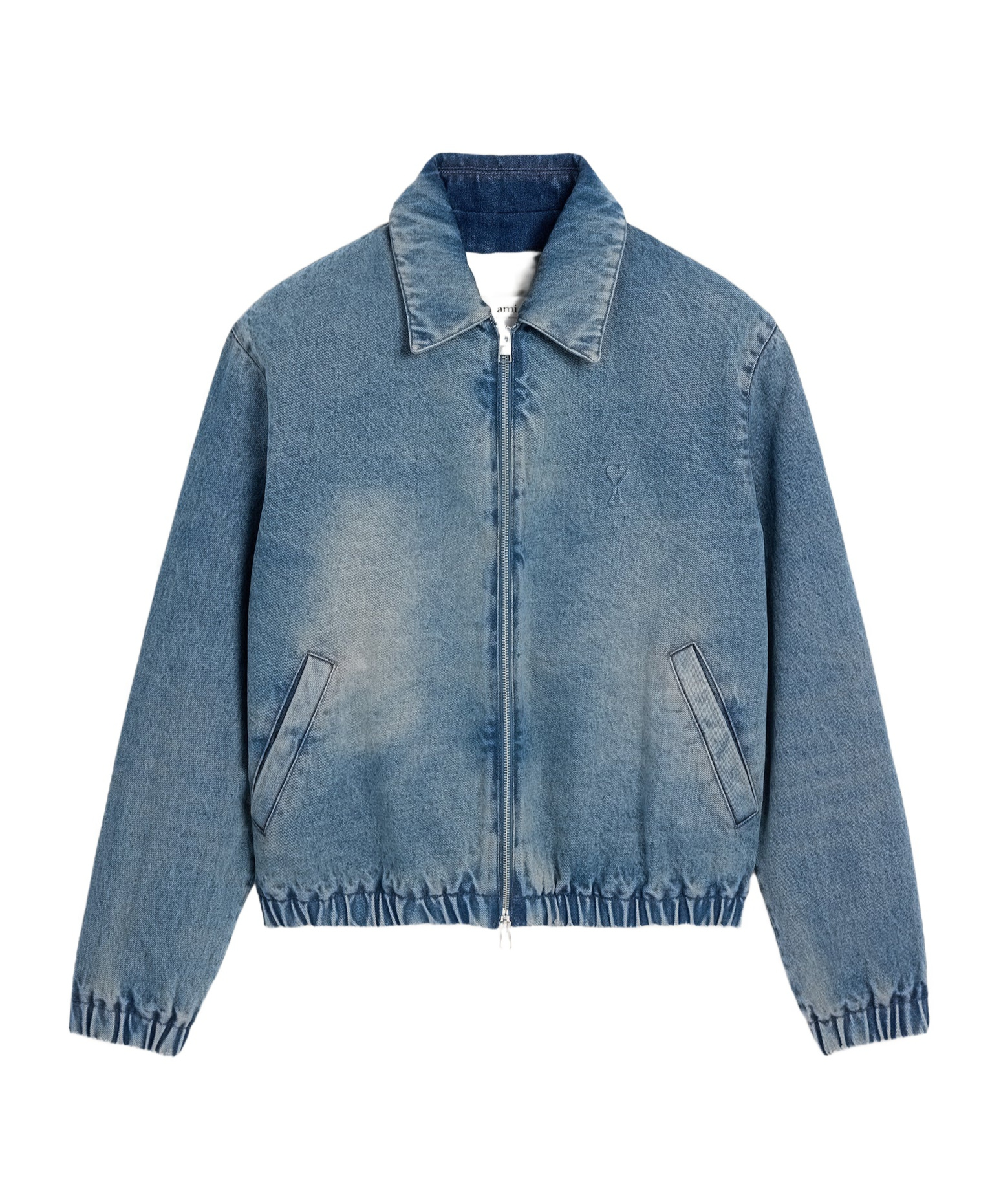 Zipped jacket in used indigo denim.