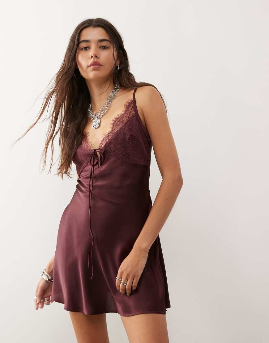 Satin mini dress with lace trims and tie front in deep burgundy red
