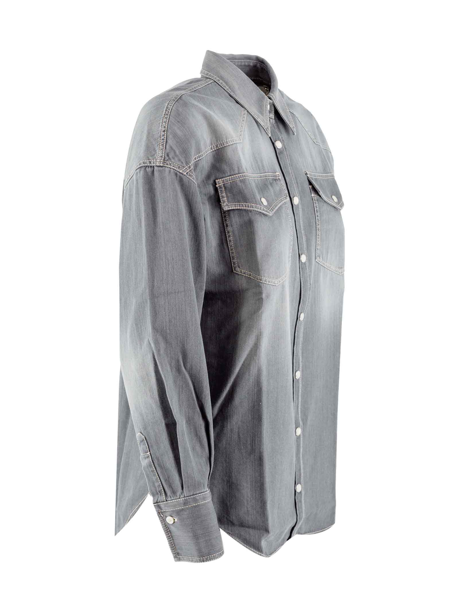 Distressed buttoned denim shirt