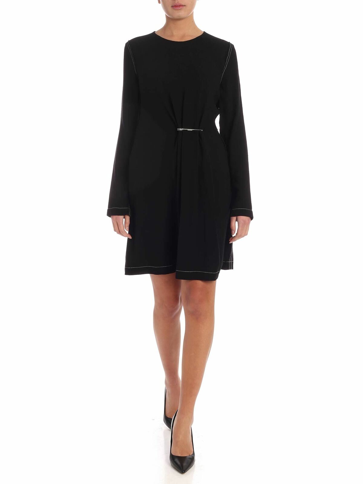 Dress in black with a safety pin
