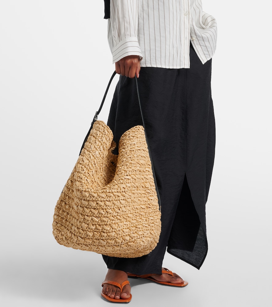Leather-trimmed raffia and paper bucket bag