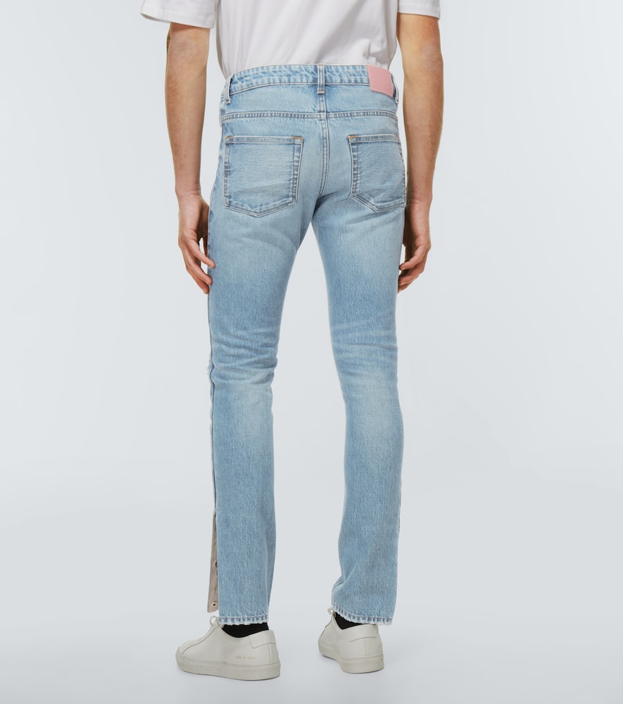 Slim-fit distressed jeans