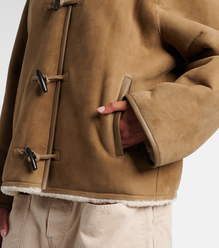 Reversible leather and shearling jacket