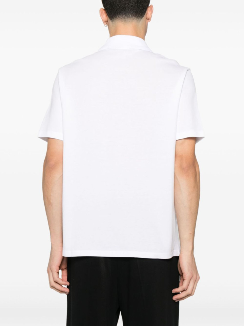 White Polo Shirt With Collar And Coin Print On The Front In Cotton Man