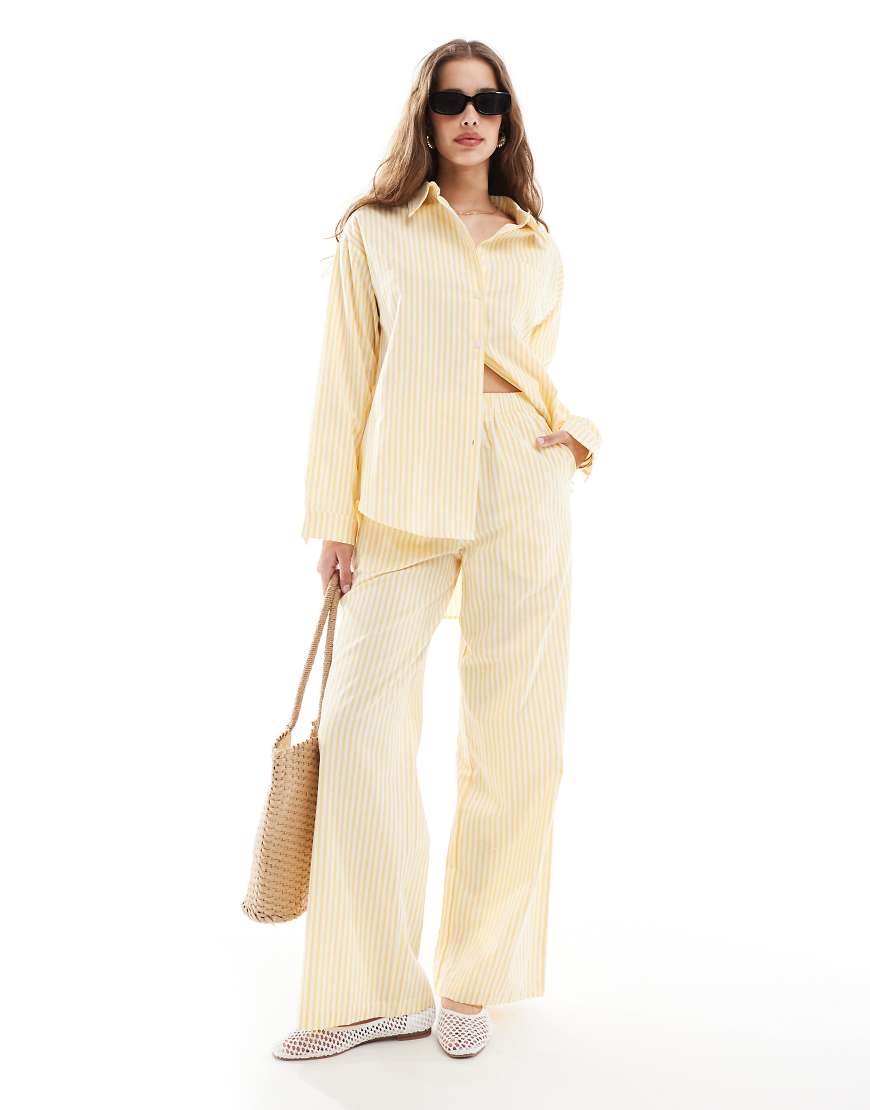 Pull on low rise straight leg trousers in yellow stripe co-ord