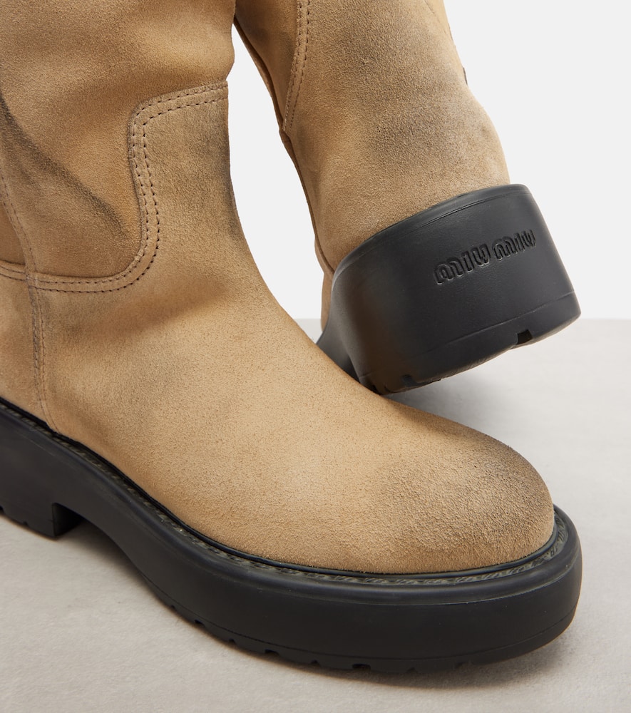 Shearling-lined suede knee-high boots
