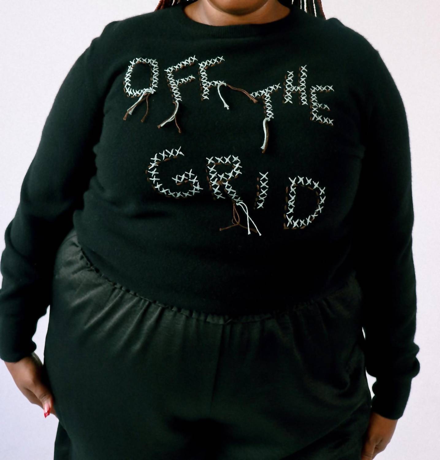 Off The Grid Crewneck Sweater In Black