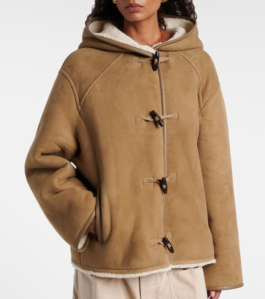 Reversible leather and shearling jacket
