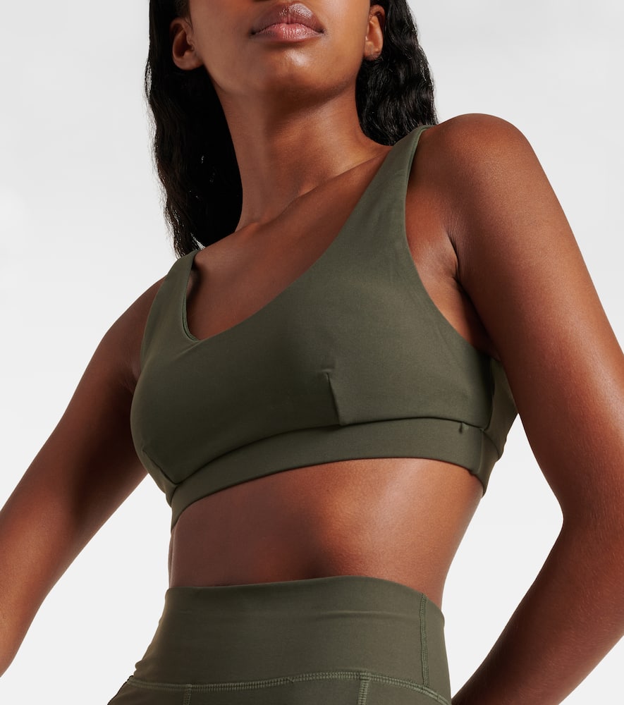 The Upside Peached Daisy logo sports bra
